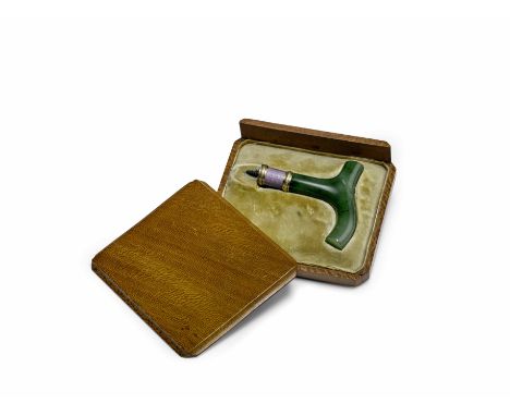 A varicoloured gold, enamel and jade parasol handleFabergé, workmaster Henrik Wigström, St. Petersburg, 1898-1908deep green j