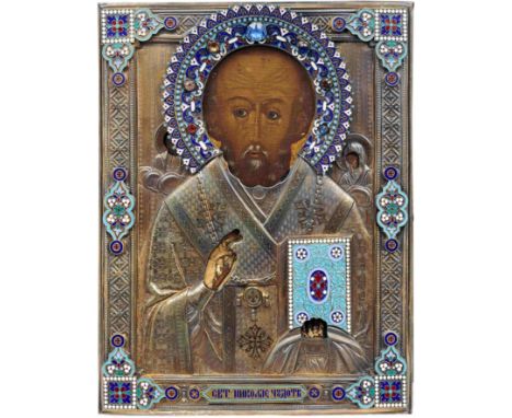 Icon of St NicholasRussia, 20th centurypainted in strong colours, St. Nicholas flanked by Mother of God and Christ in silver-