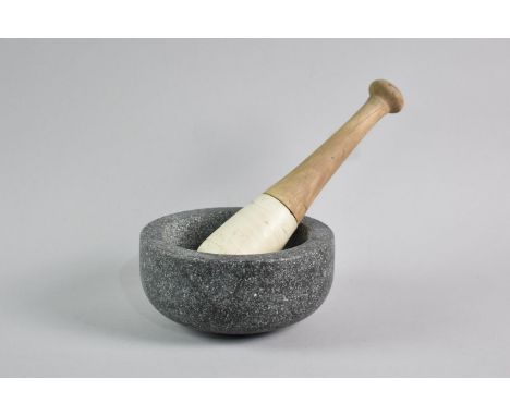 A Modern Granite Mortar with Earlier Wooden Handled Pestle, 16cms Diameter