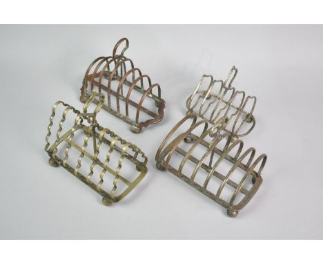 A Collection of Four Vintage Toast Racks