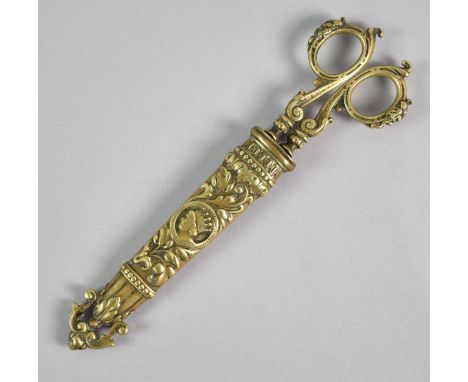 A Pair of Victorian Brass Handled Chatelaine Scissors in Tapering Embossed Sheath Decorated in Relief