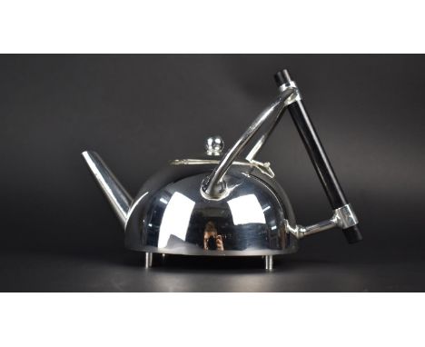 A Reproduction Dresser Style Chromed Teapot with Ebonized Handle, 21cms Long