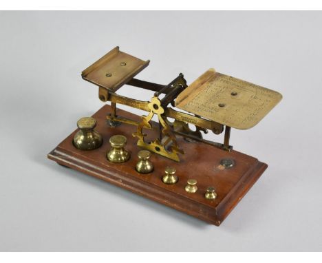 A Pair of Late Victorian Brass and Mahogany Postage Scales with Weights on Rectangular Plinth, 20cms Wide