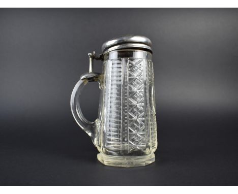 A Continental Silver and Cut Glass Stein, the Hinged Lid with Chased Foliate Decoration, 17.5cm high