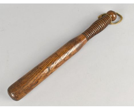 An Early 20th Century Turned Wooden Truncheon with Ribbed Handle, 33cms Long