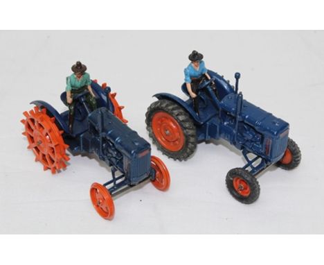 A DIE-CAST MODEL FORDSON MAJOR E27N TRACTOR with driver and ANOTHER with spadelug wheels 