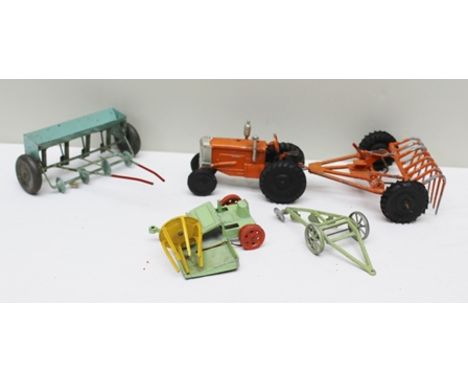 A CAST LEAD PAINTED TRACTOR and variousdie-cast and tin-plate farm implements 