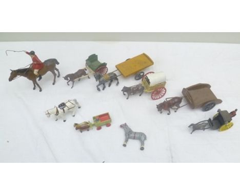 A BRITAINS DIE-CAST MODEL OF A FARM CART AND BAY PONY, together with five other die-cast and wood horse drawn carts and trail