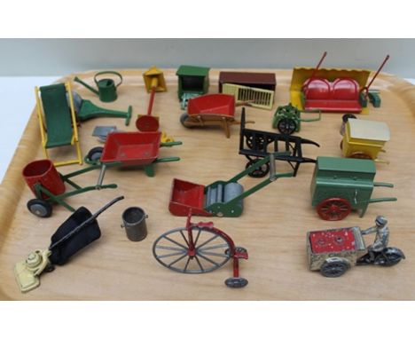 A QUANTITY OF PAINTED MINIATURE CAST METAL GARDEN ITEMS, includes, push mower, deck chair, water bowser, wheelbarrows, garden