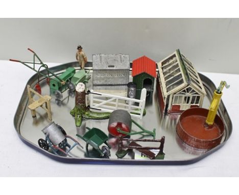 A QUANTITY OF CAST LEAD GARDEN ITEMS includes greenhouse, stile, garden roller, wheelbarrow, gate, implements, waterpump, etc