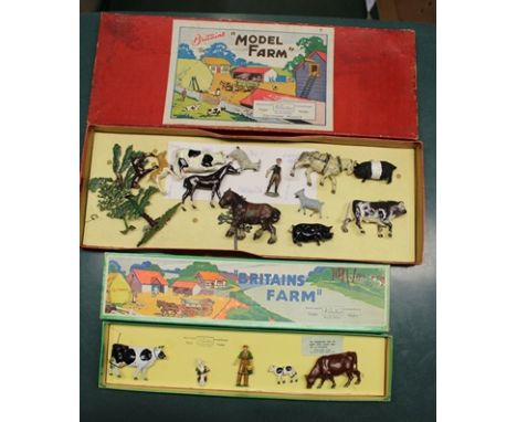 W BRITAIN 'BRITAINS FARM' containing five original figures milkmaid, two cows and two calves in OVB together with another W B