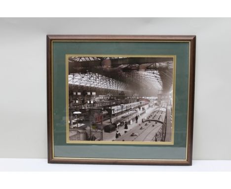 A PHOTOGRAPH OF NEW STREET STATION, BIRMINGHAM with steam engine, circa early to mid 20th century, 39cm x 48cm mounted in a s