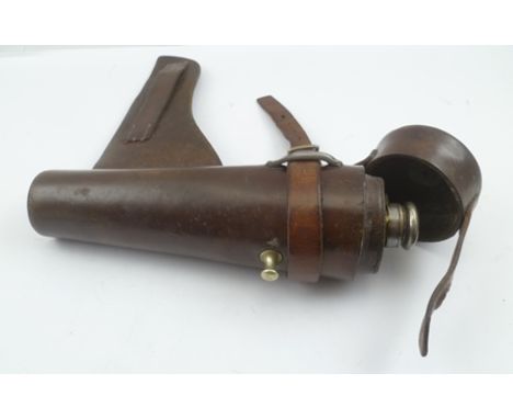AN EARLY 20TH CENTURY JAMES DIXON & SONS HUNTING FLASK with plated mount, in a leather saddle holster 