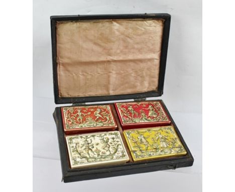 A SET OF FOUR MID 18TH CENTURY IVORY COUNTER BOXES, each box ornately decorated in engraved line and polychrome, with dancing