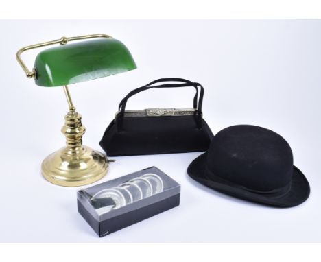 A 20th Century brass bankers lamp, adjustable green shade on circular base, together with a Dunn &amp; Co, bowler hat, a set 