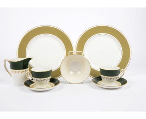 A Spode 'Green Velvet' tea service, reference Y.7869, including six cups, saucers and small plates, a milk jug, serving plate