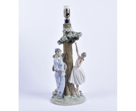 A Lladro porcelain table lamp base,'Ballet Theme', no. 5242, 57 cm high, marked to base (af)