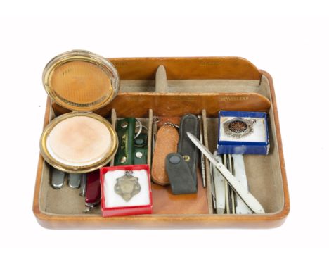 A miscellaneous collection, comprising a group of penknives, including three mother-of-pearl examples; a Stratton compact, fo