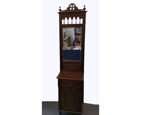 A reproduction mahogany hall stand, two hooks, single bevelled mirrored panel, shelf above single drawer and panel door, 50 c