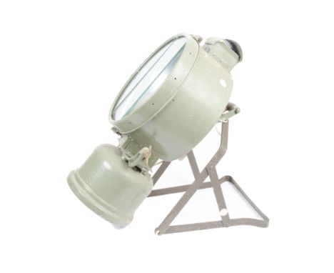 A vintage Tilley floodlight projector lamp, three piece sectional glass lens (one section af), lens marked 'Tilley-Hendon', w