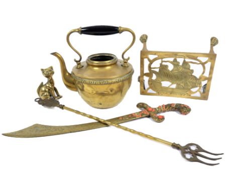 A selection of 20th Century brassware, including teapots, ornamental machete, a doorstop and more