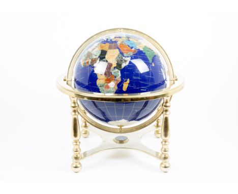 A modern specimen stone globe, brass gimbal mounted base with compass, 47 cm high