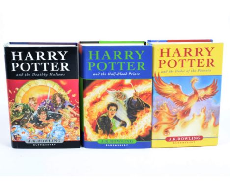 Three Harry Potter first edition books, consisting of 'The Order of the Phoenix', 'The Half Blood Prince' and 'The Deathly Ha