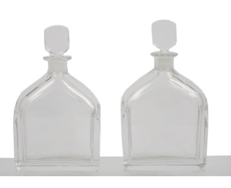 A pair of Orrefors glass decanters of flattened form decorated with engraved pheasants, signed and numbered H2453-121 to base
