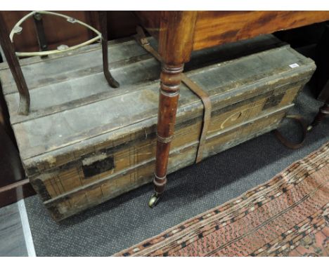 A vintage wood bound cabin trunk
