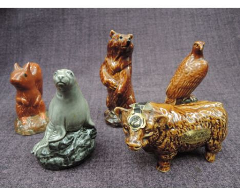 Five small ceramic animal Whisky decanters, fill levels seem low