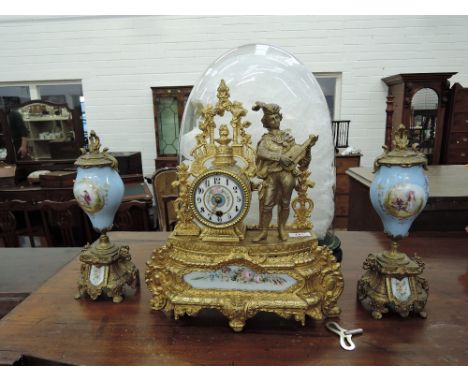 A late 19th century French Roccoco style clock garniture of gilt effect Servres design having metal musician figure applique 