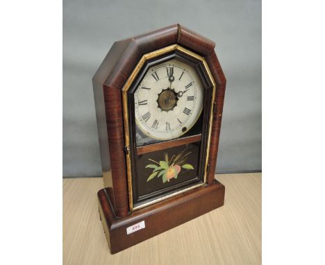 A 19th century American mantel clock by The Haven Clock Co, having painted glass panel