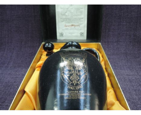 A ceramic flagon of Auchentoshan 10 year old malt whisky, Lanark 850 commemorative