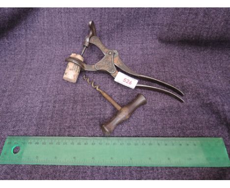 A 19th century patent lever corkscrew and a traditional corkscrew
