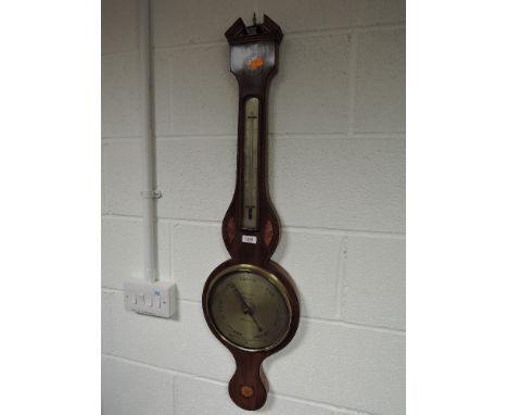A 19th Century mahogany wheel barometer having scroll inlay decoration with  thermometer scale and silvered dial for D Luvati