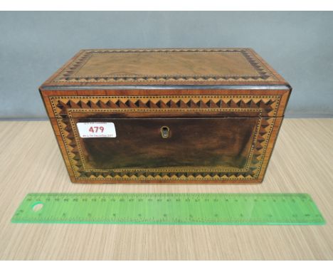 A 19th century mahogany tea caddy having Tunbridgeware inlay decoration