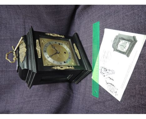 A mid 20th century Elliott mantel clock in the 18th century style having  ebonized case and striking movement numbered 21993,