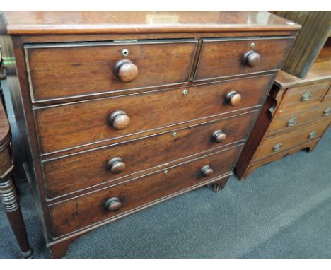 A 19th century mahogany chest of two short and three long cockbeaded drawers, on bracket feet