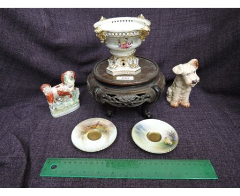 A 19th century Derby urn having gilt heightened mask and fruit decoration, an oriental treen stand, a Staffordshire dog, a Sy