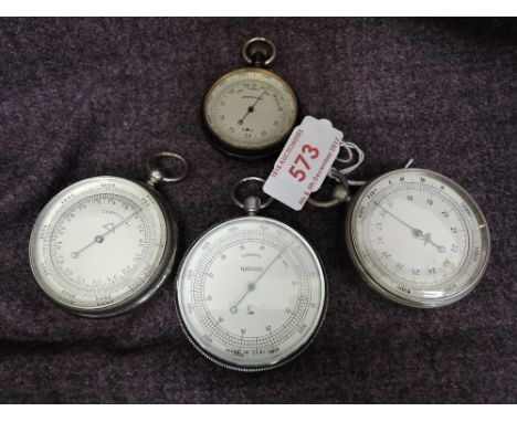 A vintage London made pocket barometer in gun metal case and three later pocket barometers including Compens, in chrome cases