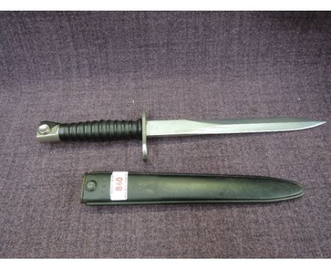 A Swiss pattern 1957 F.W. Bayonet with scabbard, in very good condition