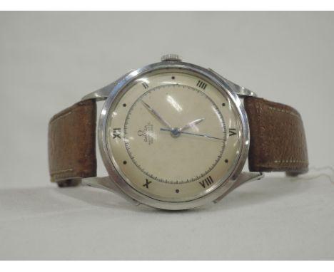 A gents 1940's Omega automatic steel wrist watch no: 10550705 having a Roman numeral and dot face with sweeping second hand a