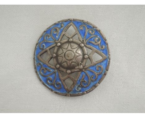 A Scottish silver brooch in the form of a shield having blue enamel and pierced decoration, stamped IONA AER to reverse, Birm