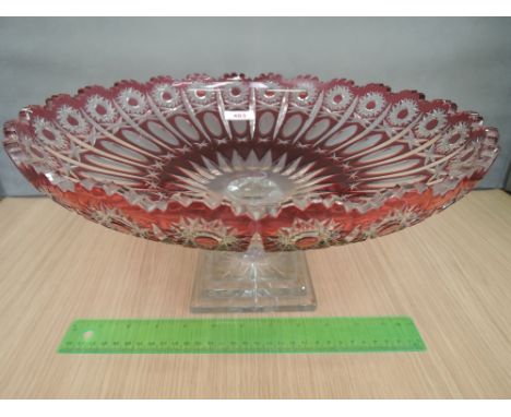 An early 20th century ruby and clear cut glass tazza of Bohemian design 