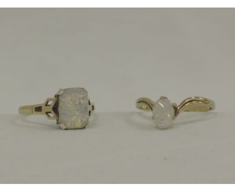 Two lady's dress rings having opal stones on 9ct gold loops