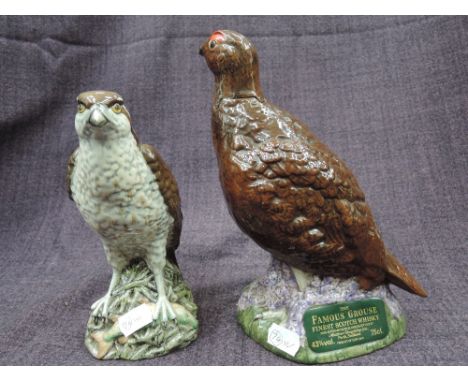 A ceramic Osprey decanter by Beneagles, 13 1/3 floz, 70% proof, a ceramic Grouse decanter by Famous Grouse, seal broken 