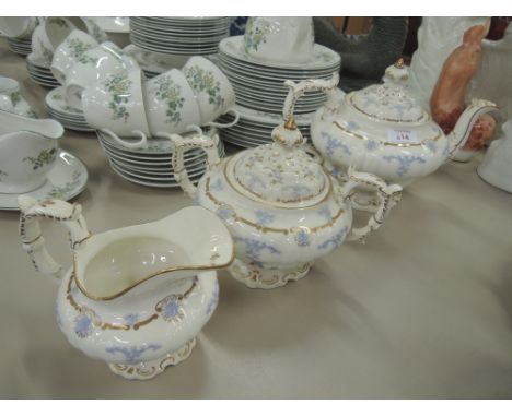 A Rockingham style, early 19th century tea set having gilt heightened and applique decoration