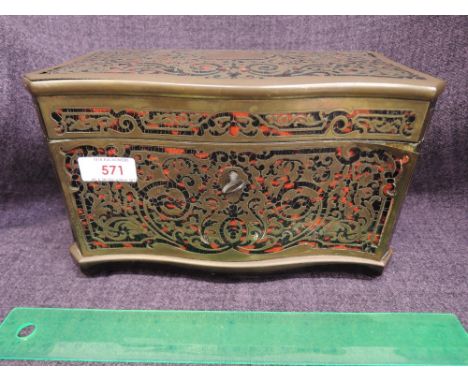 A late 19th century Boulle style tea caddy having brass overlay foliate fret decoration and two division mahogany interior