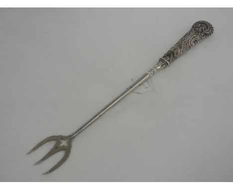 A silver handled toasting fork having moulded decoration, Birmingham 1893, Adie & Lovekin Ltd