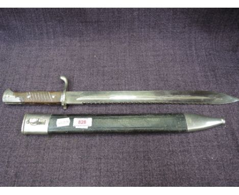 A German Mauser bayonet with saw back and leather and metal scabbard, very good condition, W.K. & Co.